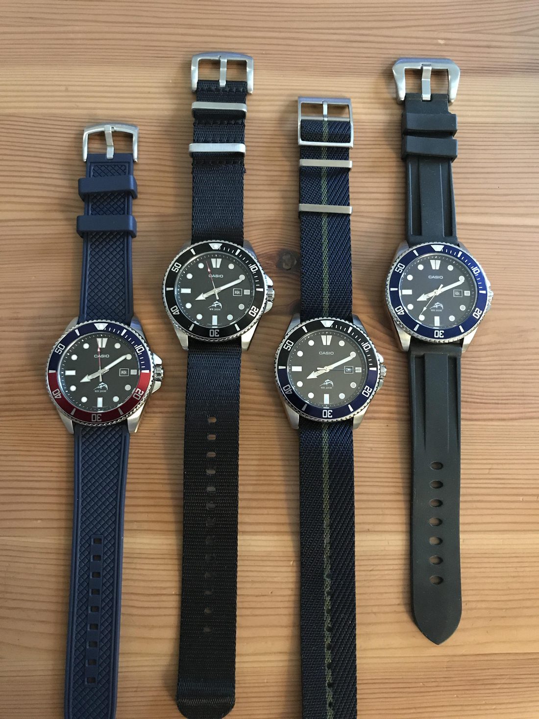 Four Casio Duro watches in different colorways on straps
